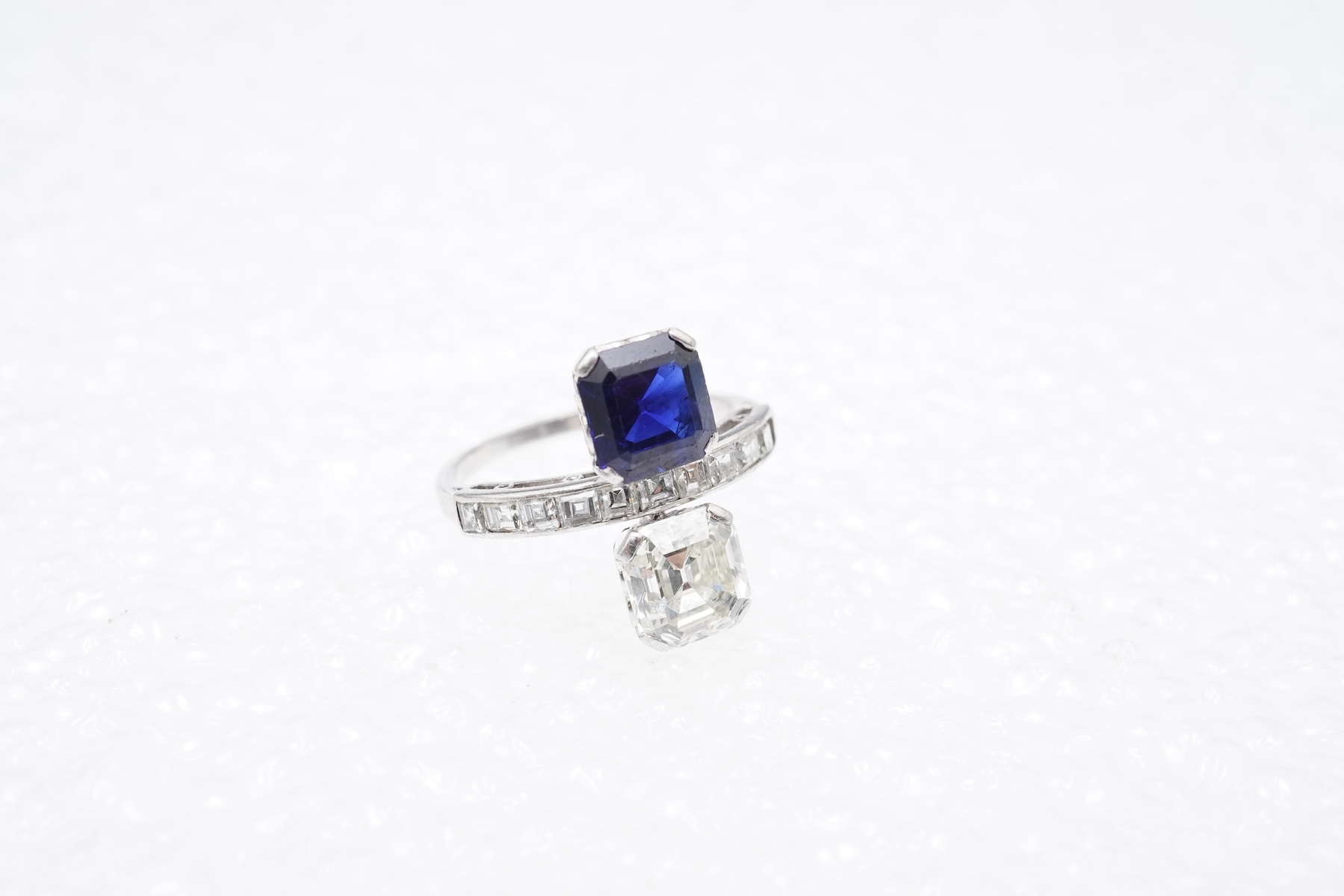 An Art Deco sapphire and diamond 'toi-et-moi' ring, 1930s